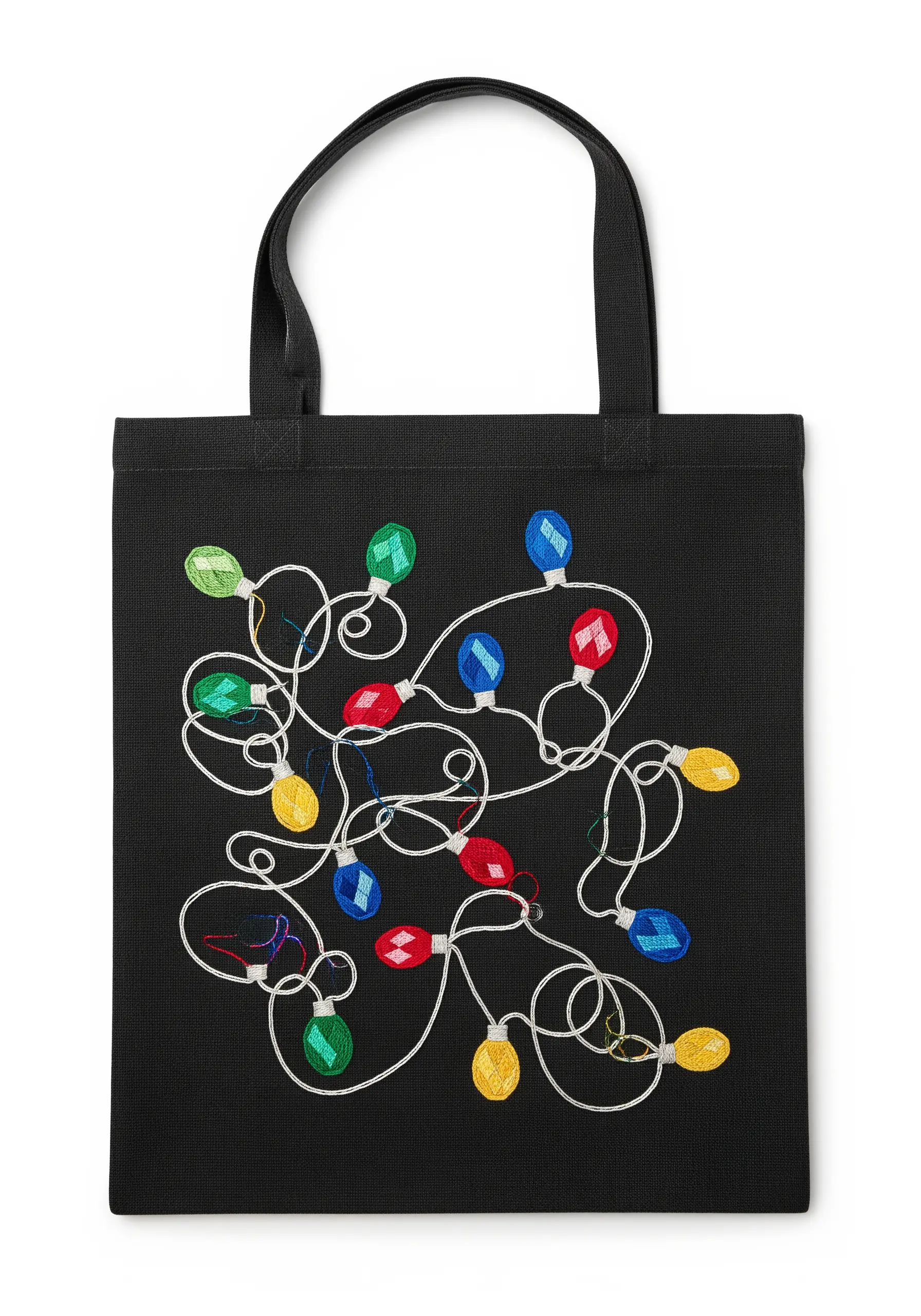 Colorful, tangled Christmas lights embroidered with satin stitch bulbs on a black tote bag.
